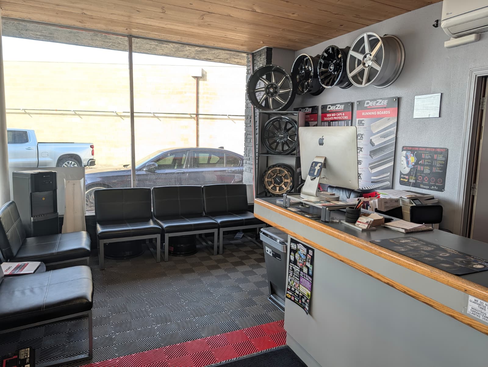 Elite Tire Center interior showroom with custom wheel display in Yakima WA